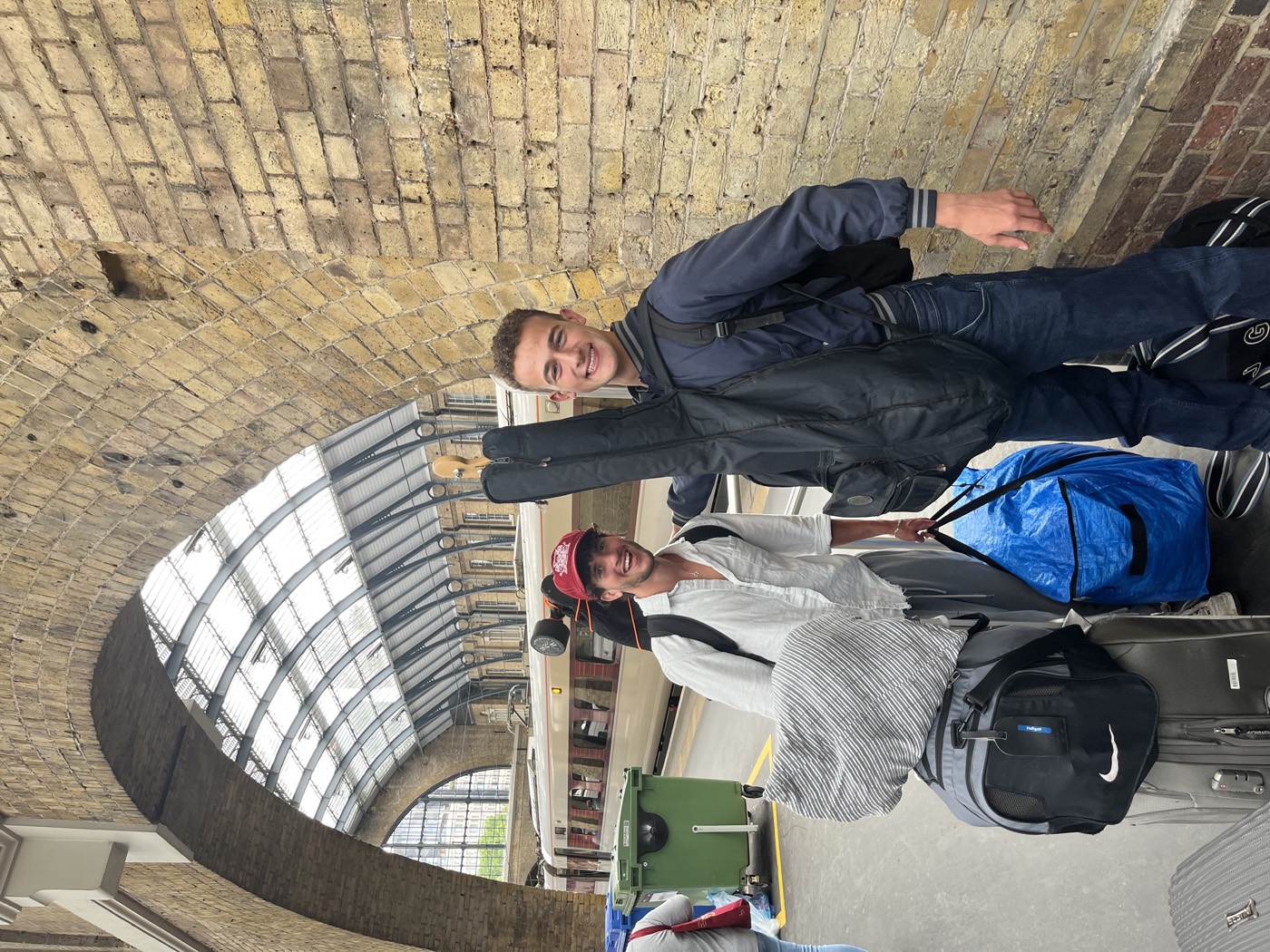 Nicky and Josh with their bags at Kings Cross, heading off